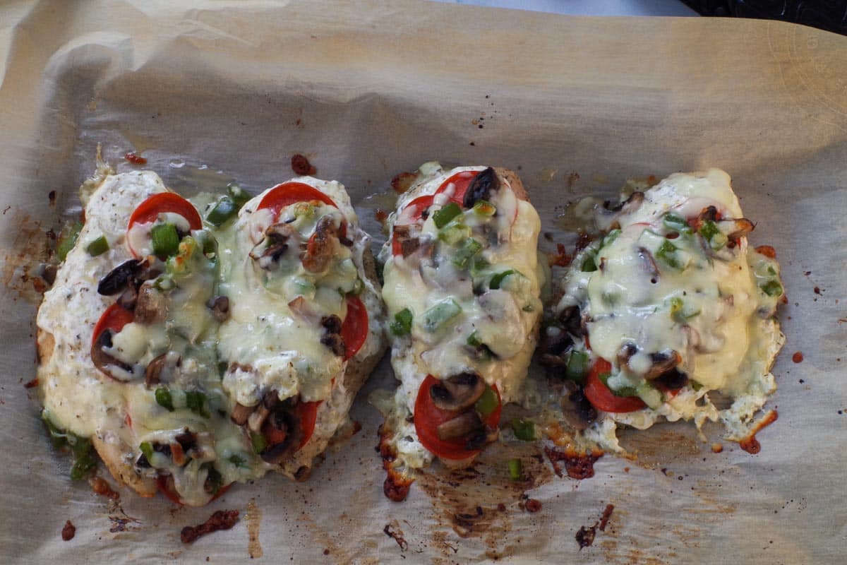 Baked Healthy White Chicken Pizza on a parchment lined sheet pan.