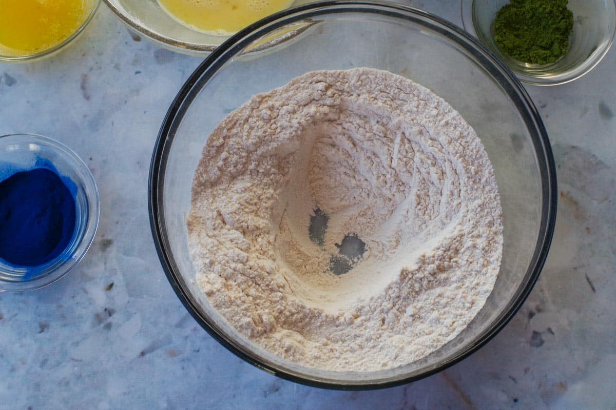 Dry ingredients with a hole in the middle.