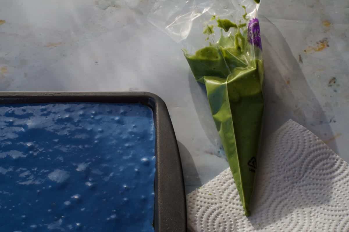 Pastry bag filled with green matcha batter.