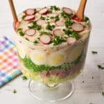 Layered Leftover Ham Salad in a trifle bowl.