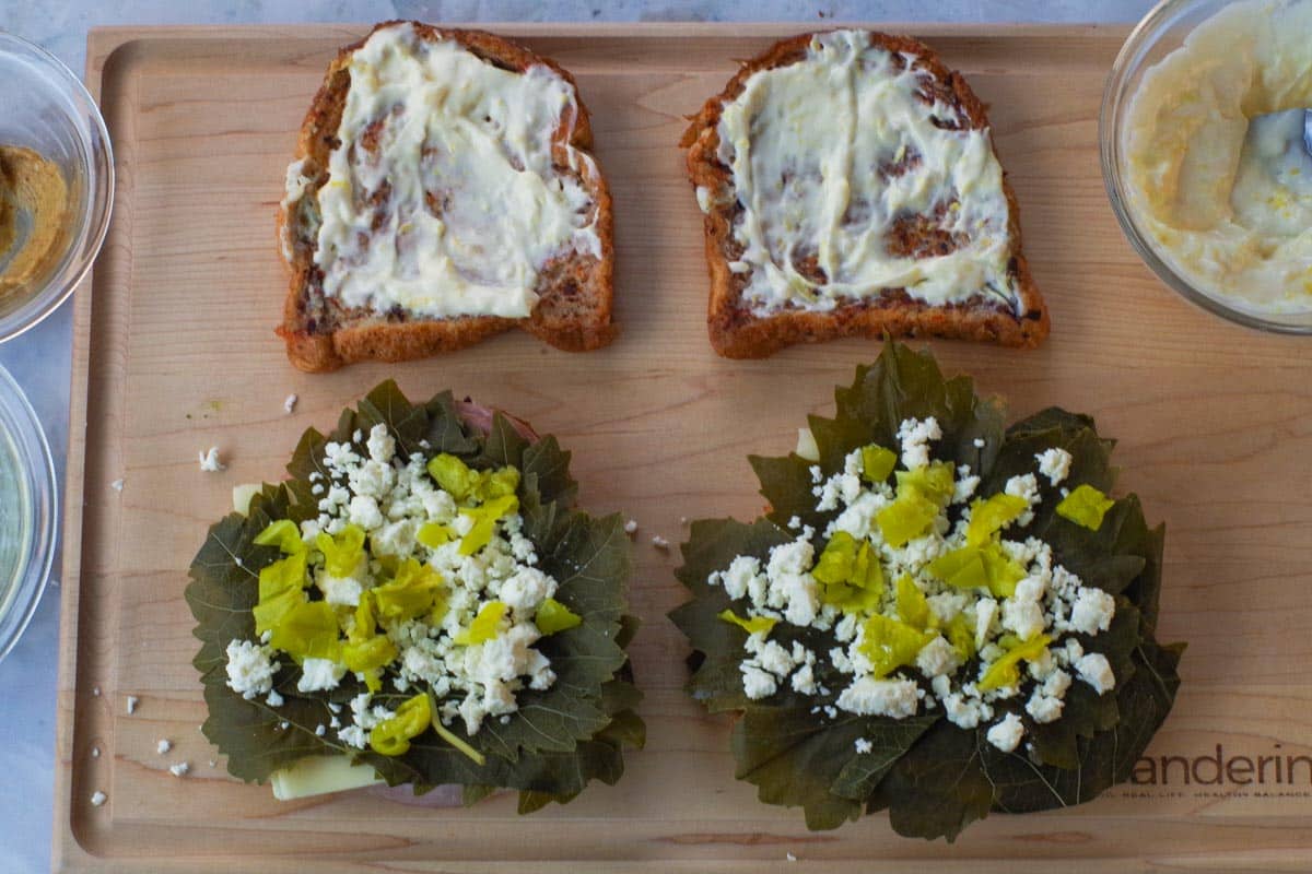Grape leaves, feta and pepperoncini added to the