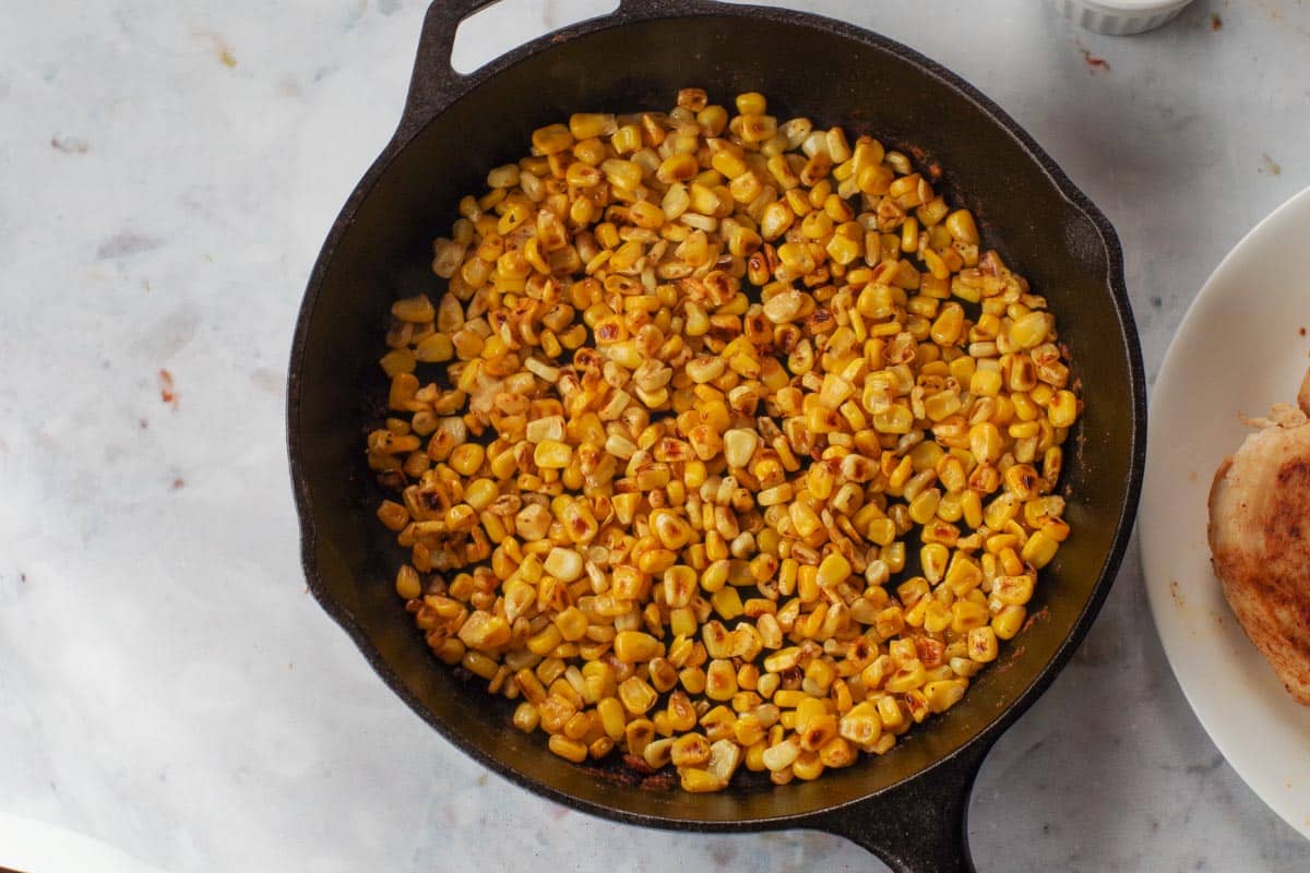 Corn 'charred' in cast-iron pan.