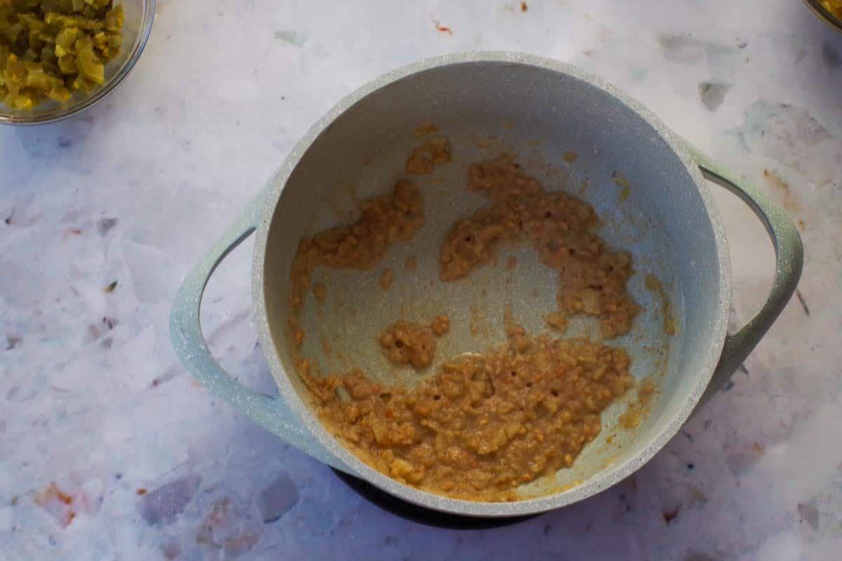 Flour and cumin added to garlic/butter/onion  mixture