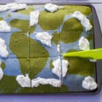 Earth Day Sheet Pan Pancakes with some whipped cream on them,