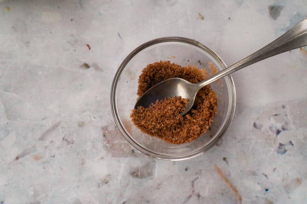 Topping ingredients mixed together in a small glass bowl.