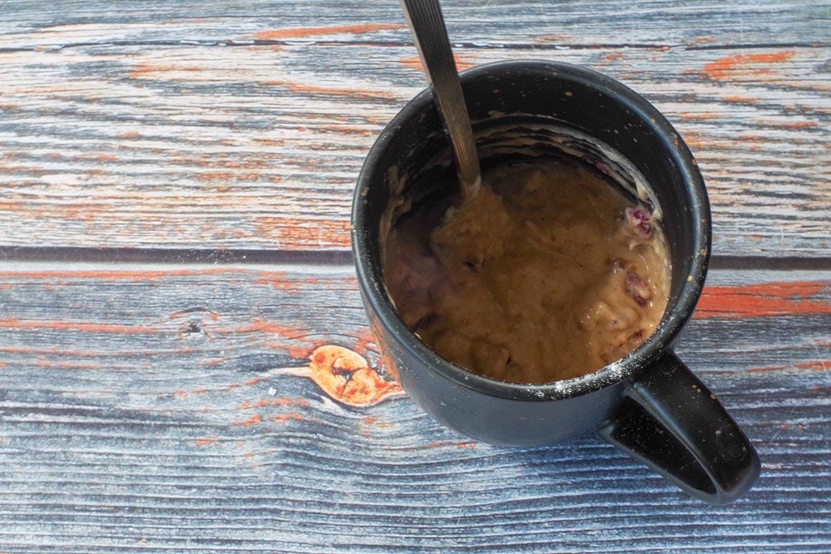 Rhubarb folded into mug mixture.