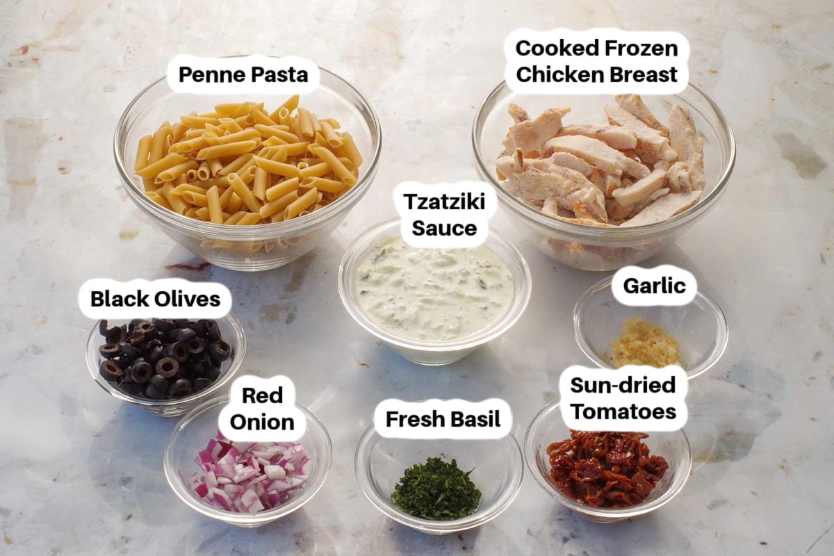 Tzatziki Pasta ingredients in glass bowls, labelled.