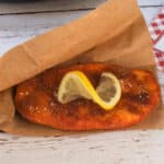 Healthy Air Fryer Beaver Tail pastry with a lemon twist, in a paper envelope