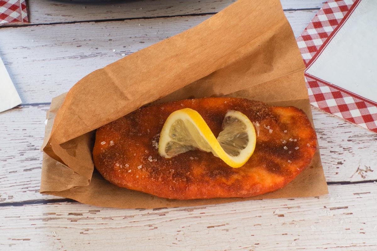 Healthy Air Fryer Beaver Tail pastry with a lemon twist, in a paper envelope
