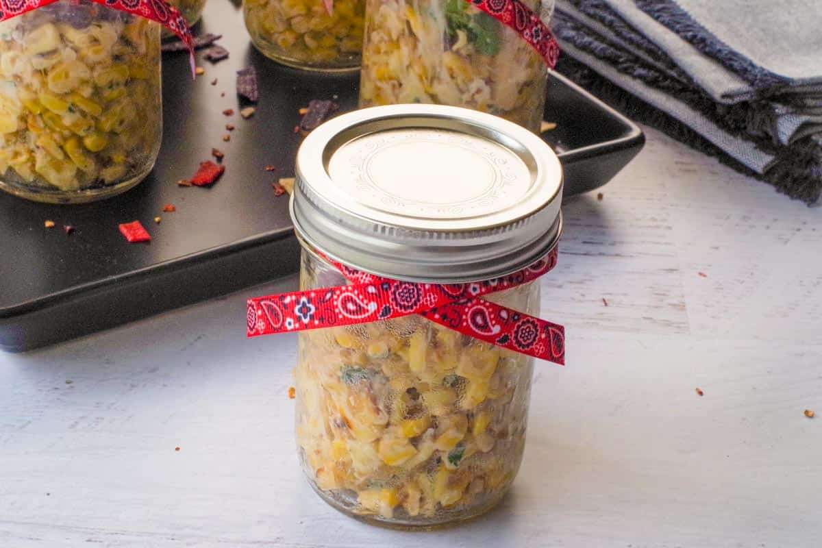 Healthy Stampede Street Corn Cup with a lid on