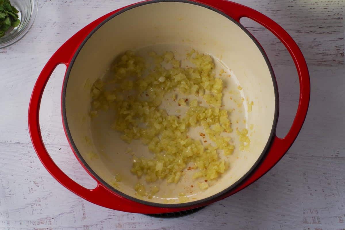 Fried onions cooked in a Dutch oven.