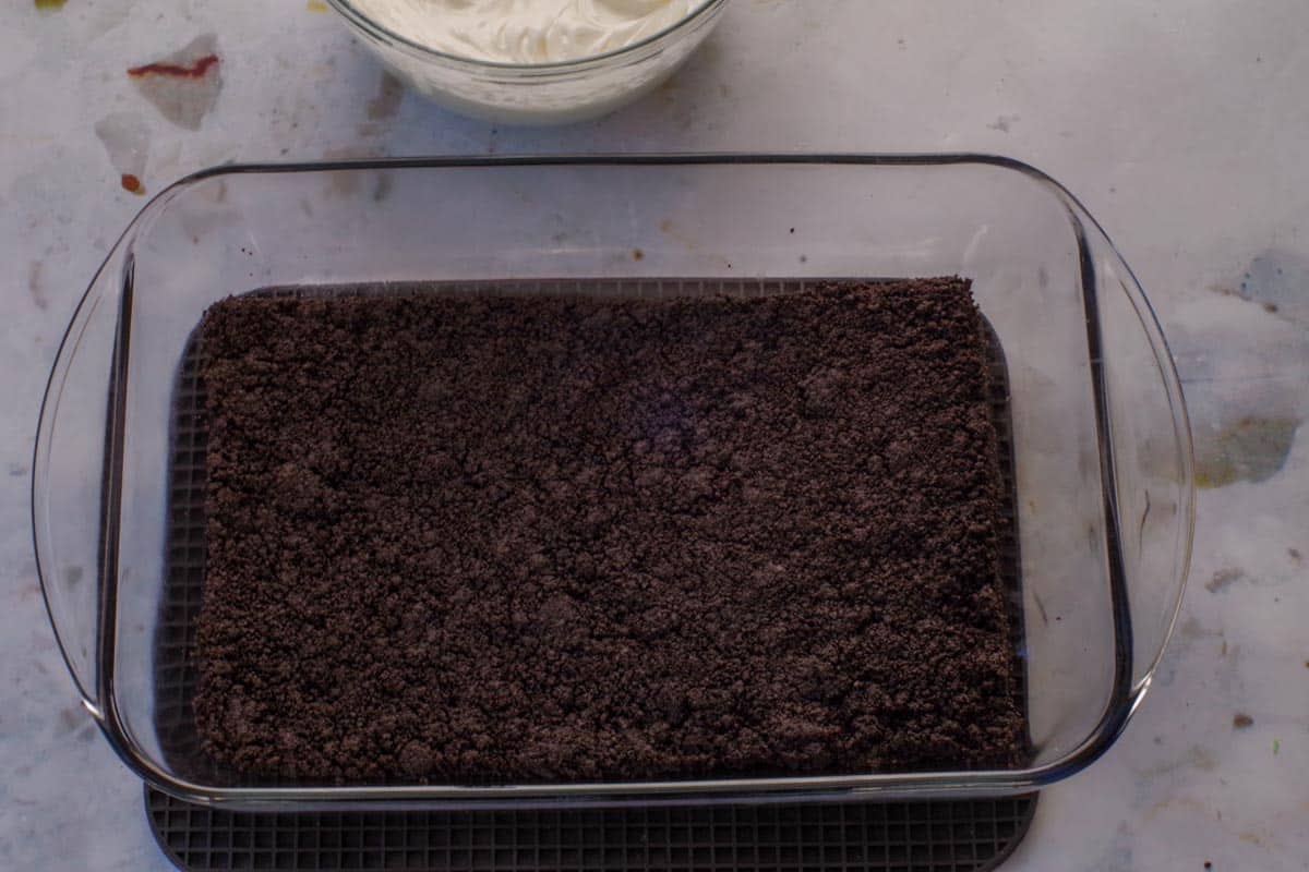 Chocolate baking crumb base removed from oven and cooled completely.