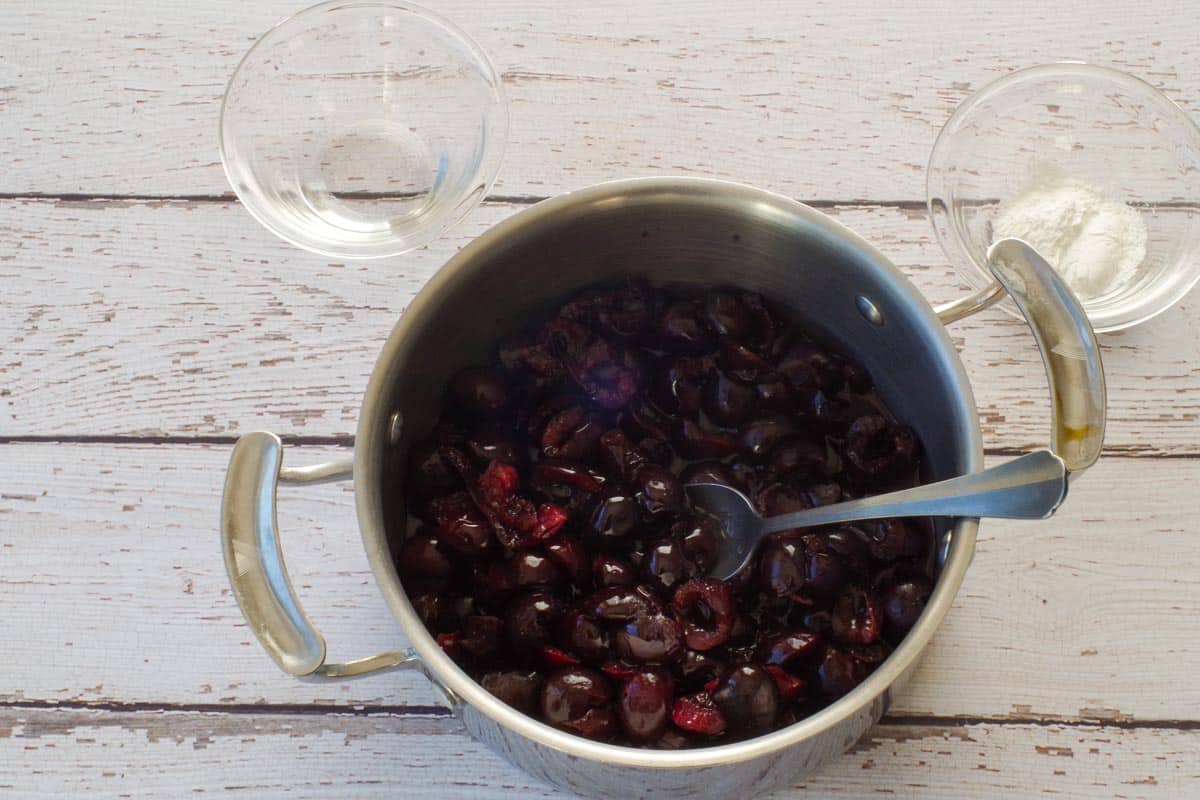 Cherries, juice, agave and salt in a small pot.