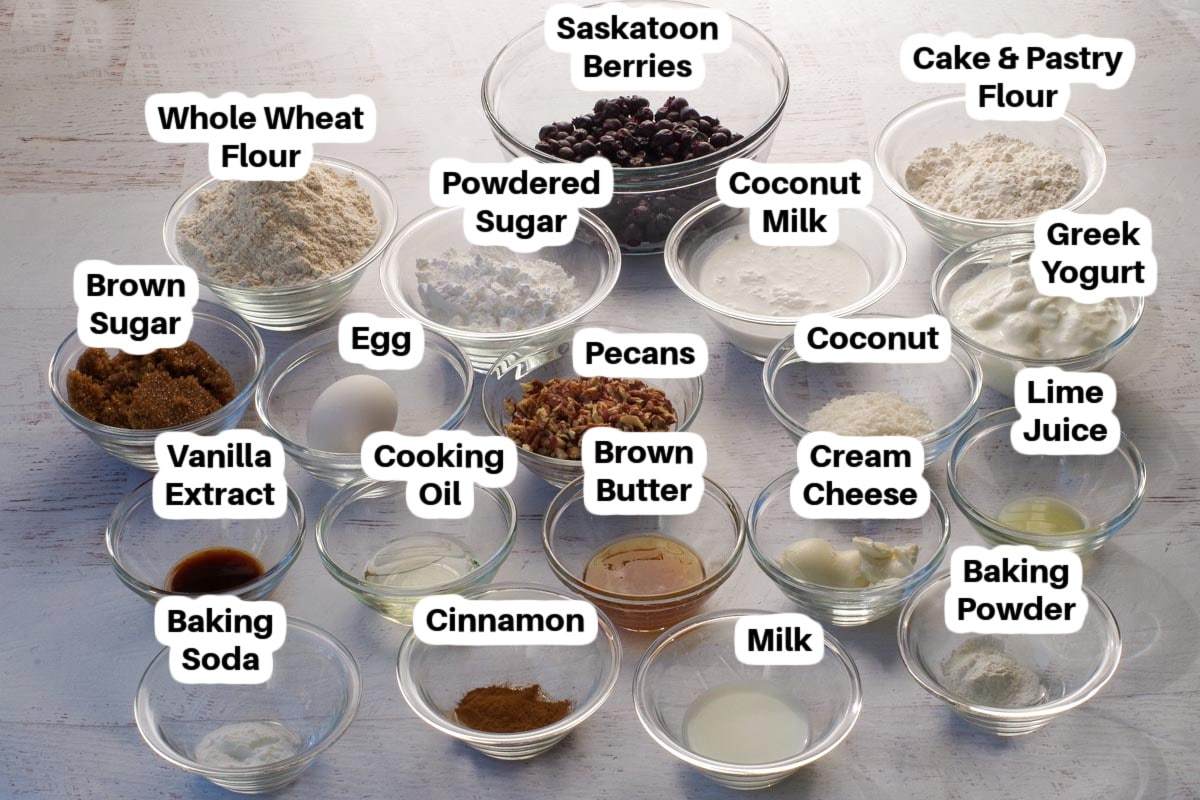 Ingredients in Saskatoon Berry Loaf in glass bowls, labelled.