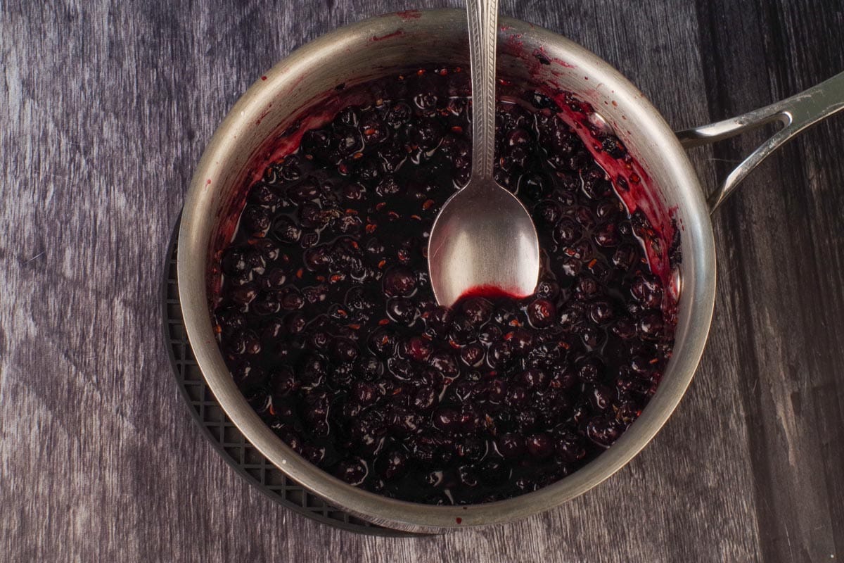 Saskatoon Berry Sauce (for meat) thickened in saucepan.