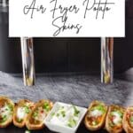 A tray of crispy and healthy air fryer potato skins in front of a Ninja Air Fryer.