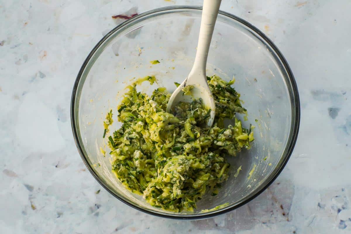 Grated and strained zucchini mixed with all other ingredients.