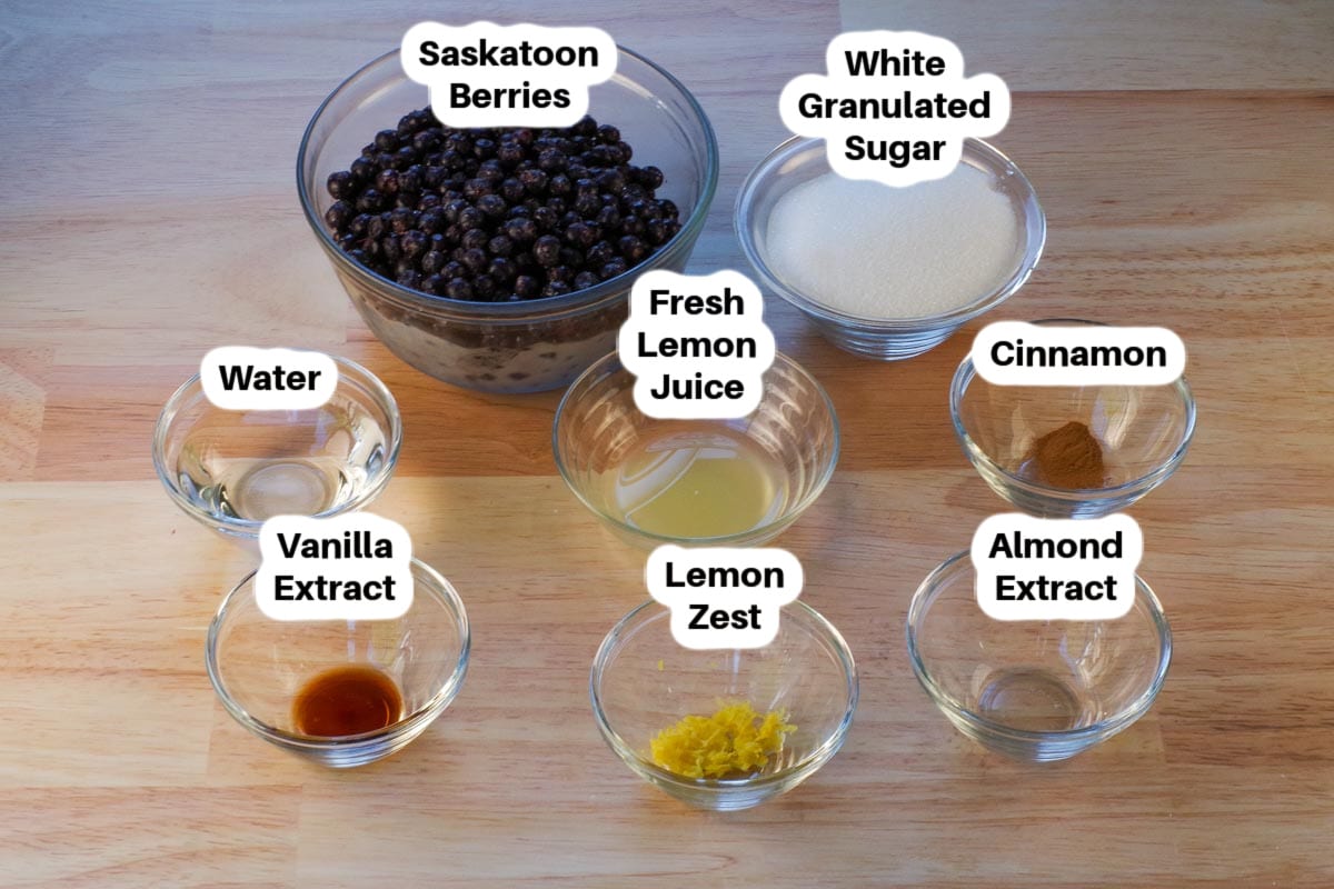 Saskatoon Berry Pie Jam Ingredients in glass bowls, labelled.
